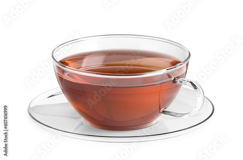 Glass cup of tea and saucer isolated on white