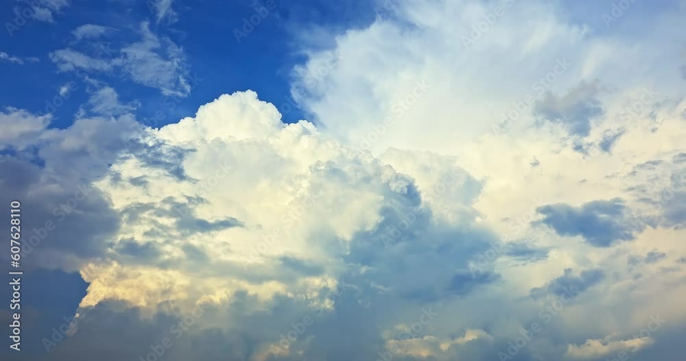 Clouds like high mountains on the blue sky Clouds like high mountains on the blue sky