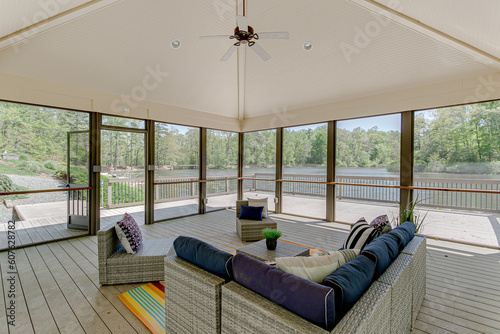 Interior of Lake House with Summer Outdoor Furniture and Screened Walls