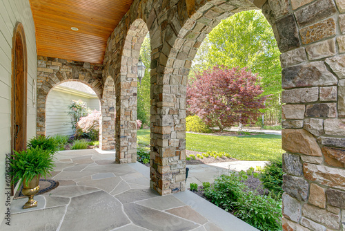 Southern Country Front Porch with Stone Arch Entry