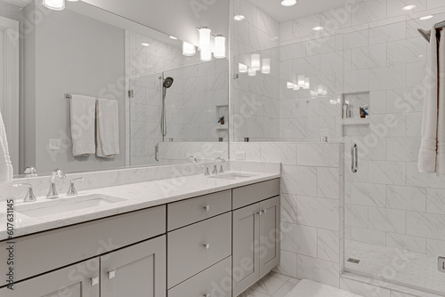 Modern Chic Primary Bathroom Interior with Double Vanity and Glass Shower