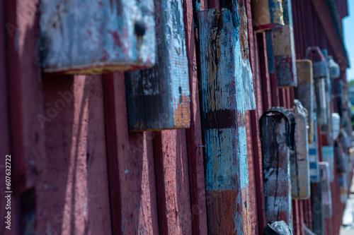 Wooden buoys hanging on a wall