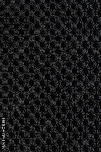 Pattern of dark cloth with circle holes