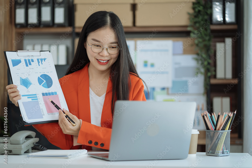 Businesswoman analysis graph company financial in office. Businesswoman analysis graph company financial in office.