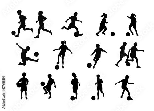 Kids playing soccer silhouettes