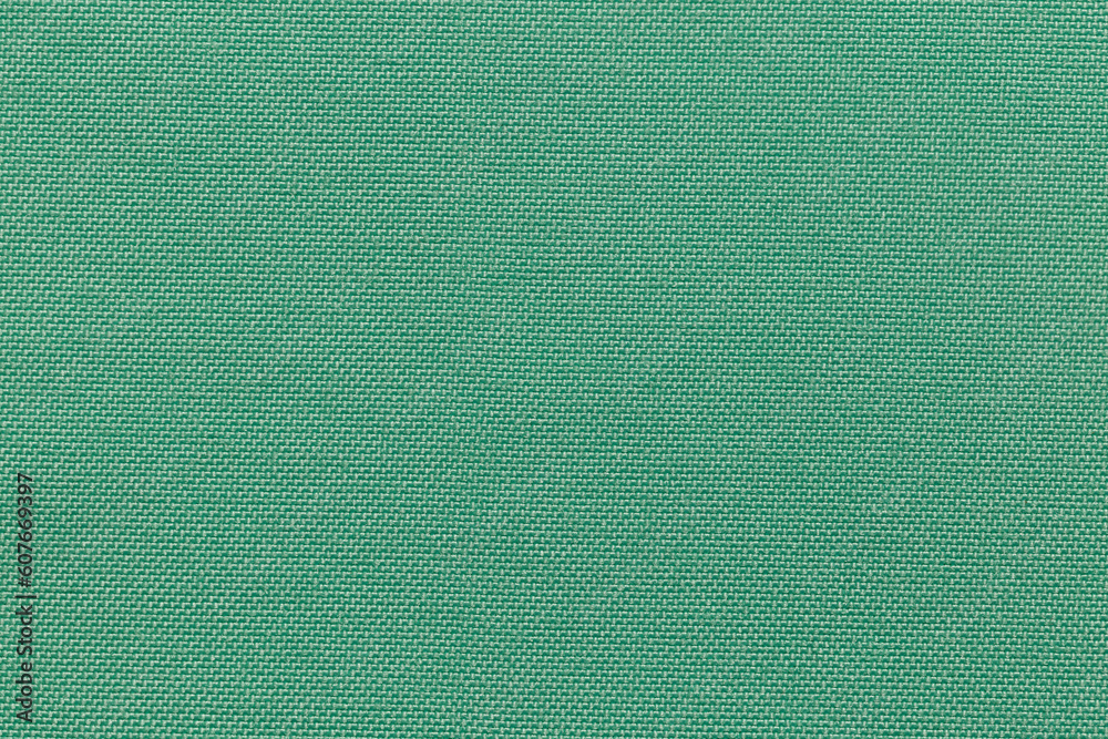 Fototapeta premium Green color fabric cloth polyester texture and textile background.