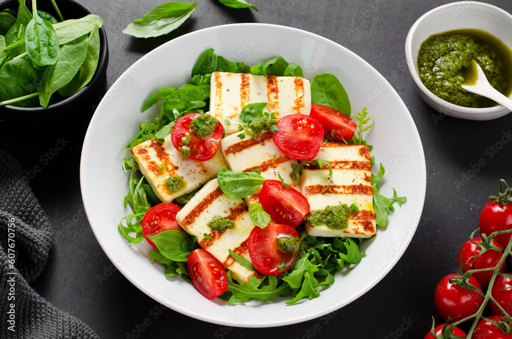Grilled Halloumi Cheese with Cheery Tomatoes and Pesto with Arugula, Spinach, and Basil, Ketogenic Paleo Diet Lunch Grilled Halloumi Cheese with Cheery Tomatoes and Pesto with Arugula, Spinach, and Basil, Ketogenic Paleo Diet Lunch