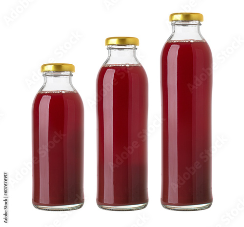 Three glass bottles with juice