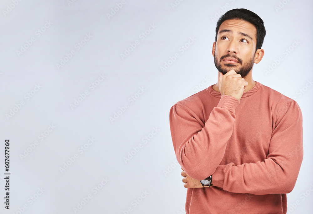 Man, thinking and idea mockup in studio or planning, decision and choice with white background. Asian male, model and curious face with doubt, questions or confused guy try to remember with space Man, thinking and idea mockup in studio or planning, decision and choice with white background. Asian male, model and curious face with doubt, questions or confused guy try to remember with space