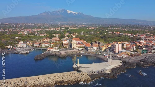 View of Stazzo old city, Catania, Sicily, Italy. Summer beach and sea