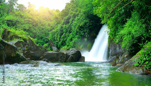 Beautiful waterfall with sunlight in jungle, Haew Suwat Waterfall.
