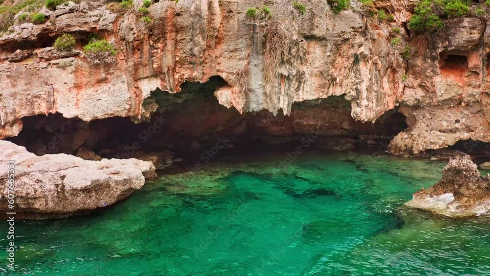 Landscape with seaside cave in Gökova bay and mountainous coastline Landscape with seaside cave in Gökova bay and mountainous coastline