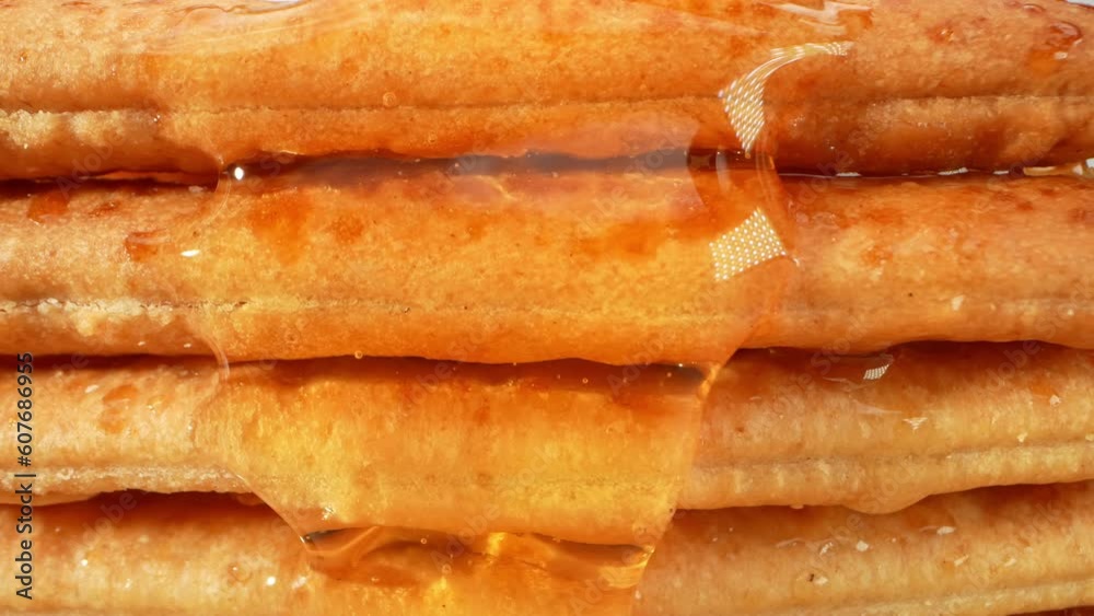 Experience a moment of sheer delight as the camera zooms in, capturing the intricate beauty of honey gently enveloping sugar-coated biscuits. A delicious work of art. beauty in stunning close-ups.
Experience a moment of sheer delight as the camera zooms in, capturing the intricate beauty of honey gently enveloping sugar-coated biscuits. A delicious work of art. beauty in stunning close-ups.