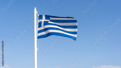 Greek flag blowing in the wind, Crete Greece