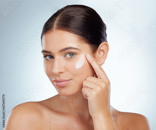 Принти на полотні Face, skincare and beauty of woman with cream in studio isolated on a white background