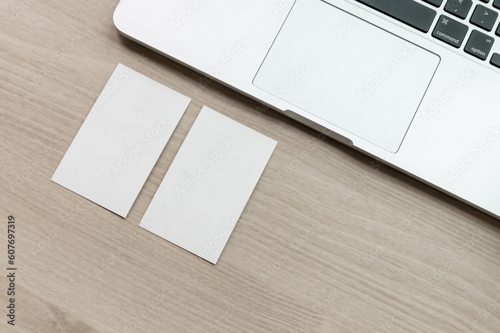 Pass business cards during meetings. Blank business card, mockup, vertical business card Pass business cards during meetings. Blank business card, mockup, vertical business card