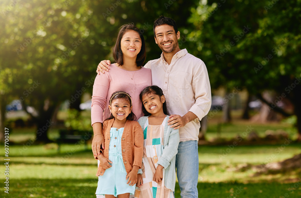 Portrait of happy family, parents and kids smile together in trees, bonding and time in nature. Mother, father and children on grass field in woods for fun outdoor adventure in garden with mock up. Portrait of happy family, parents and kids smile together in trees, bonding and time in nature. Mother, father and children on grass field in woods for fun outdoor adventure in garden with mock up.