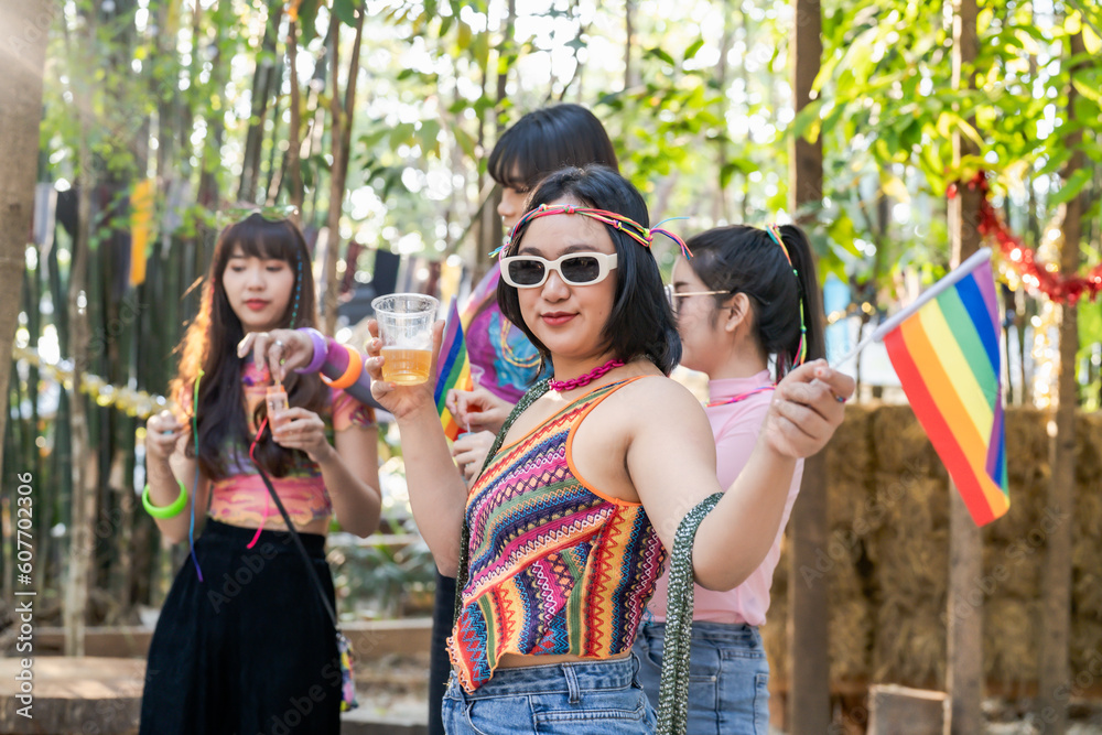 LGBTQIA Asian gay Supporters of the LGBTQ community. people having fun at LGBT pride parade. Gender Spectrum LGBTQIA Asian gay Supporters of the LGBTQ community. people having fun at LGBT pride parade. Gender Spectrum