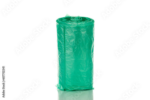 One pack of plastic trash bags, macro, isolated on white background.