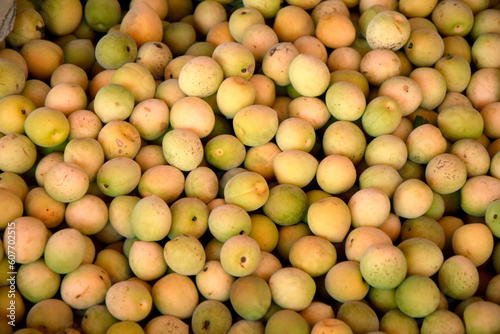 fresh plum or yellow plum background for sale in fruit market