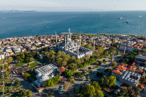 Aerial view of Sultanahmet Camii (the Blue Mosque) in Istanbul Sultanahmet district on the European side during the Muslim holiday, Turkey. photo