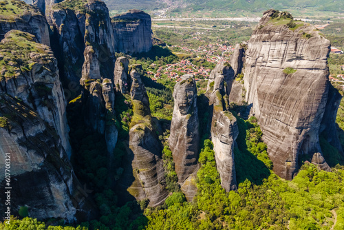 Aerial view of the landscape of Meteora unique rock formations with Kalabaka town in background, Trikala, Thessaly, Greece.