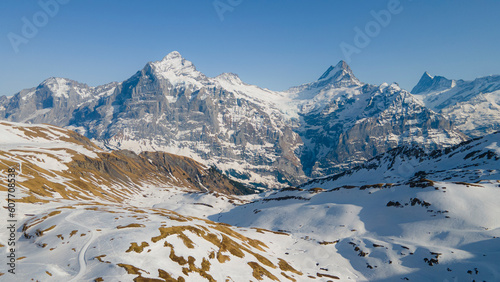 Aerial view of mountain peaks Mittelhorn and Schreckhorn in First, Grindelwald, Switzerland. photo