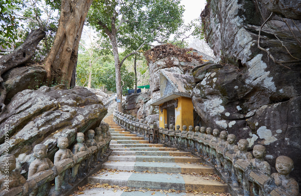 Fototapeta premium Phnom Santuk, a sacred Buddhist pilgrimage spot in Cambodia, known for its rock carvings and sculptures