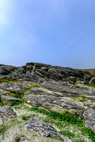 Weathered Mountain Hillside With Rocky Outcrops And Grass © Martin Lee