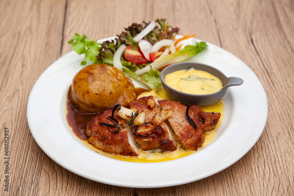 Pork sirloin steak with mash potato and bearnaise sauce Pork sirloin steak with mash potato and bearnaise sauce