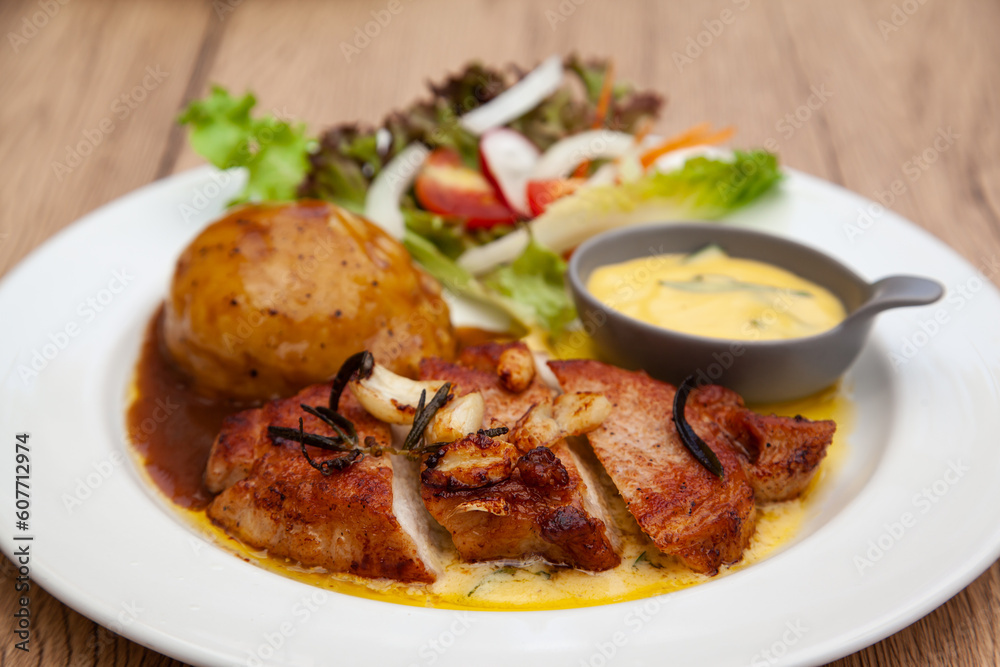 Pork sirloin steak with mash potato and bearnaise sauce Pork sirloin steak with mash potato and bearnaise sauce
