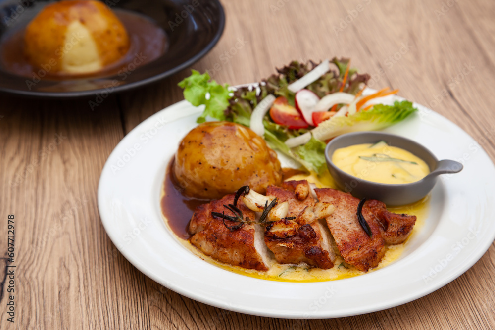 Pork sirloin steak with mash potato and bearnaise sauce Pork sirloin steak with mash potato and bearnaise sauce