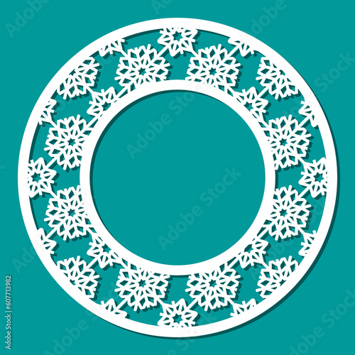 Beautiful round winter frame. Christmas border with snowflakes for photos, mirrors, congratulations. Vector template for plotter laser cutting of paper, fretwork, wood carving, metal engraving, cnc. 