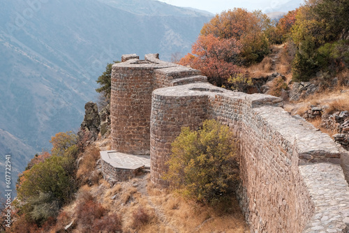 Walls of remains Smbataberd fortress on sunny autumn day. Vayots Dzor Province, Armenia. photo