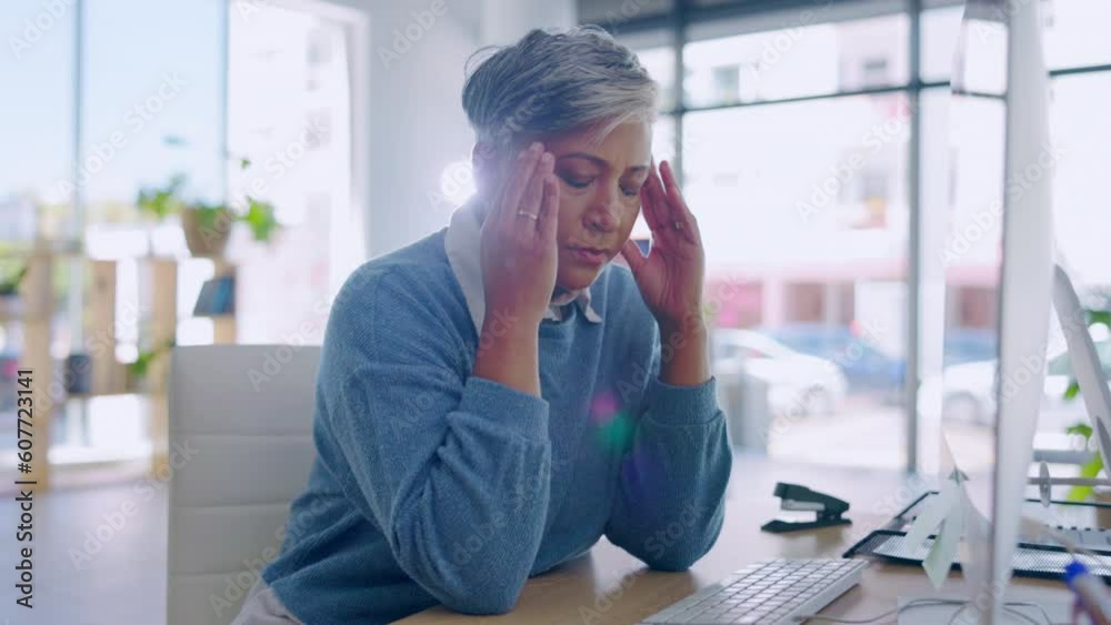 Office, headache and senior business woman with stress and anxiety from computer fail. Burnout, company employee and worker with pain and debt from bankruptcy and online research for financial crash