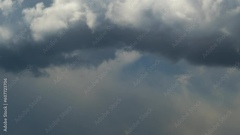 Timelapse of stormy cumulus clouds forming before thunderstorm on dark sky. Moving and changing cloudscape weather Timelapse of stormy cumulus clouds forming before thunderstorm on dark sky. Moving and changing cloudscape weather
