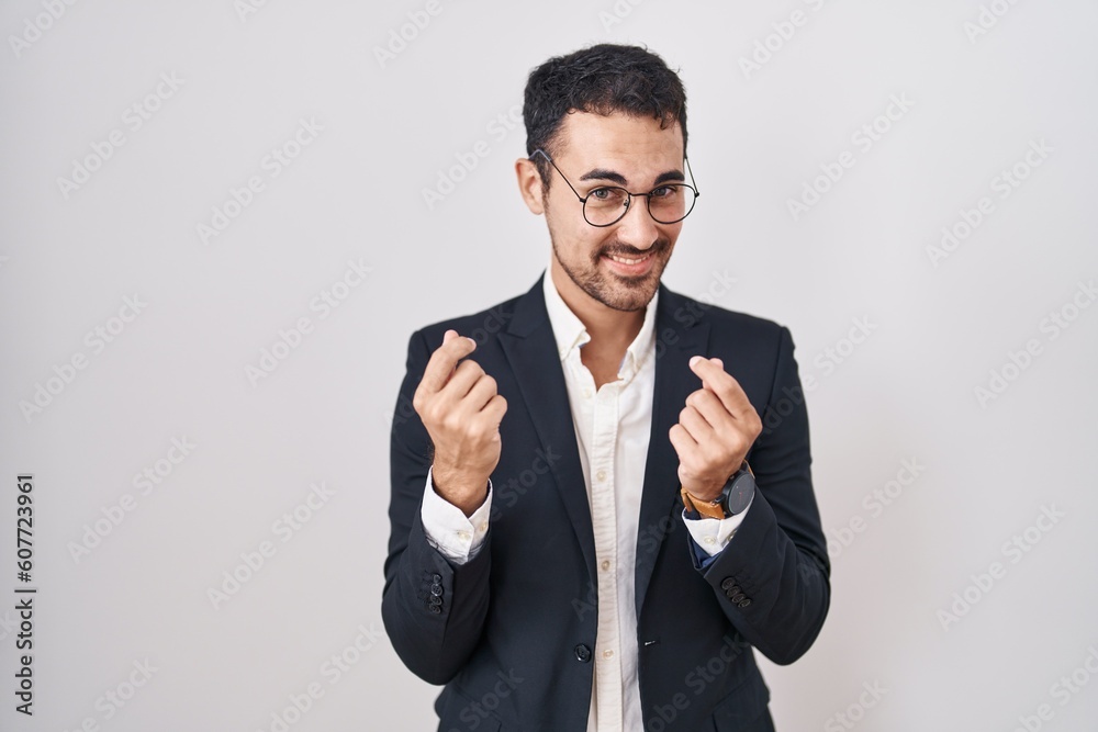 Handsome business hispanic man standing over white background doing money gesture with hands, asking for salary payment, millionaire business Handsome business hispanic man standing over white background doing money gesture with hands, asking for salary payment, millionaire business