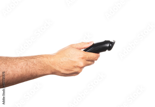 Hair trimmer in hand isolated on the white background.