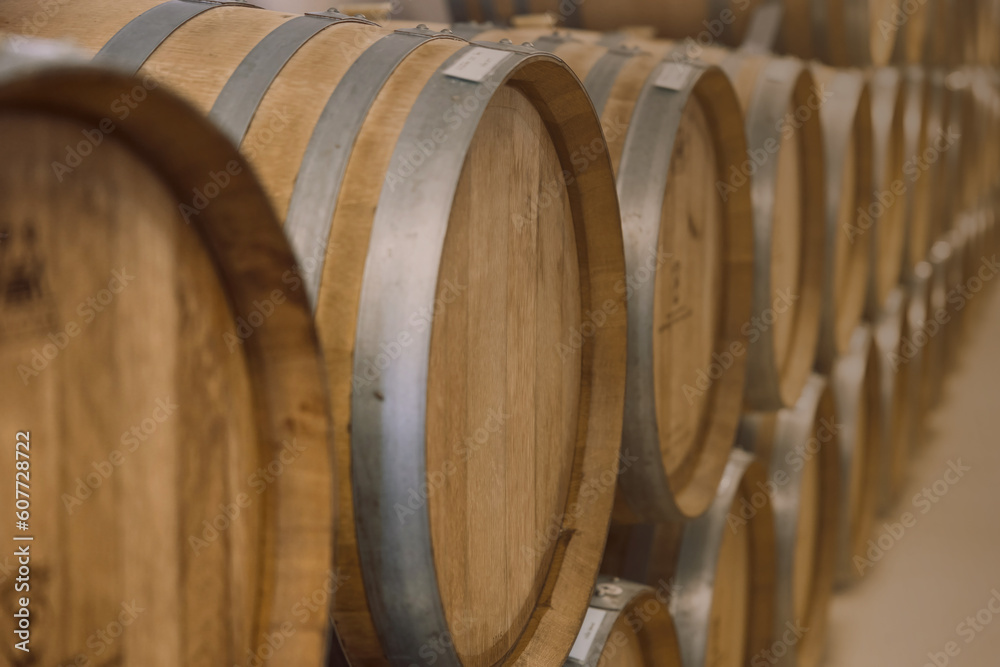 Wine fermentation barrels in wine cellar traditional winery making process for good taste and aroma of oak wood. Wine fermentation barrels in wine cellar traditional winery making process for good taste and aroma of oak wood.