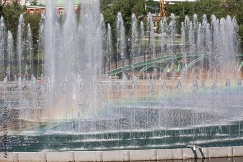 A light and music fountain and a rainbow from the sun on a spring morning. Natural Museum-reserve  Tsaritsyno . Fountain in Tsaritsyno Park.