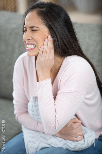 Fotografija portrait of ill female with toothache