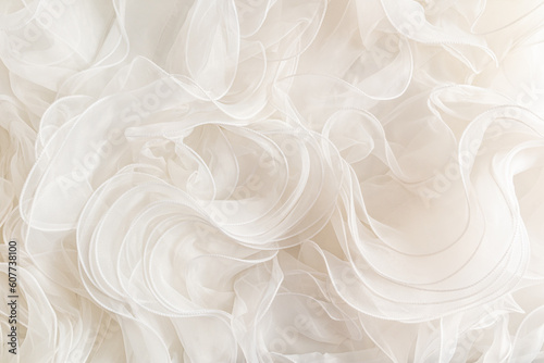 Stylish wedding background beige ruffle bridal dresses. Background illustration of wedding decor. Gentle waves of silk fabric.