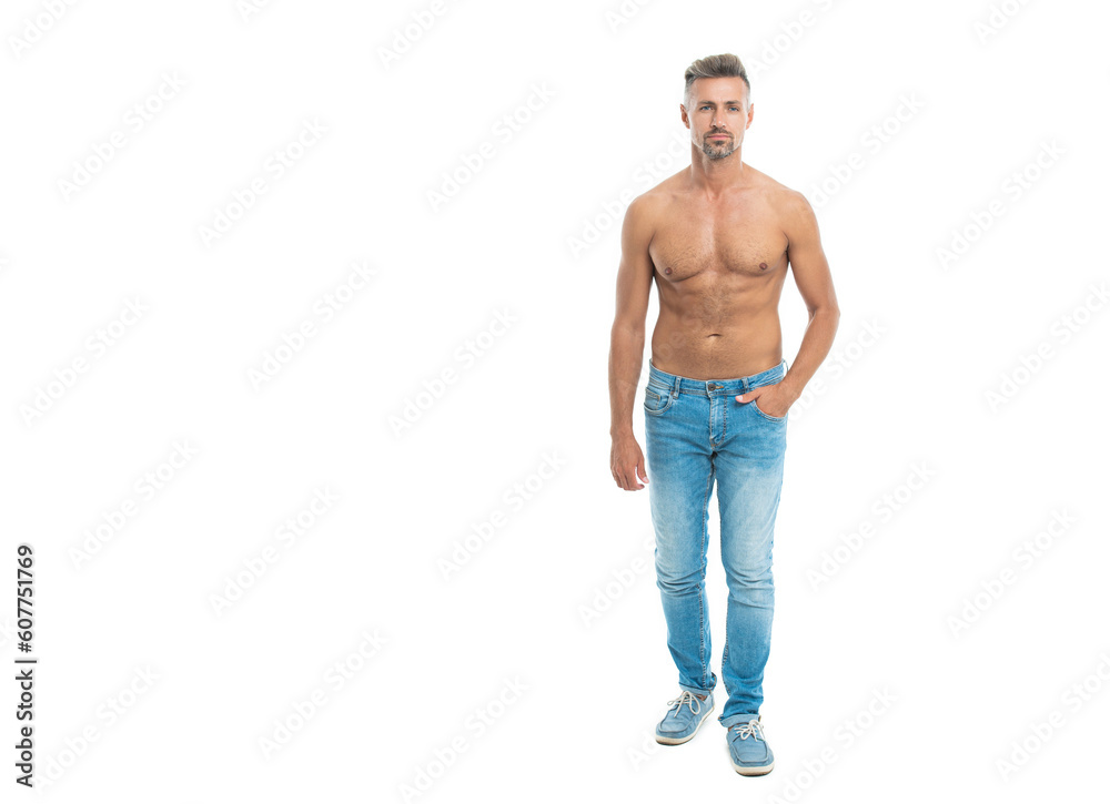 Fototapeta premium A man with physique poses shirtless showing muscular torso, banner. muscular man with torso isolated on white. shirtless man with muscular torso. fit and muscular man shows abs and torso in studio