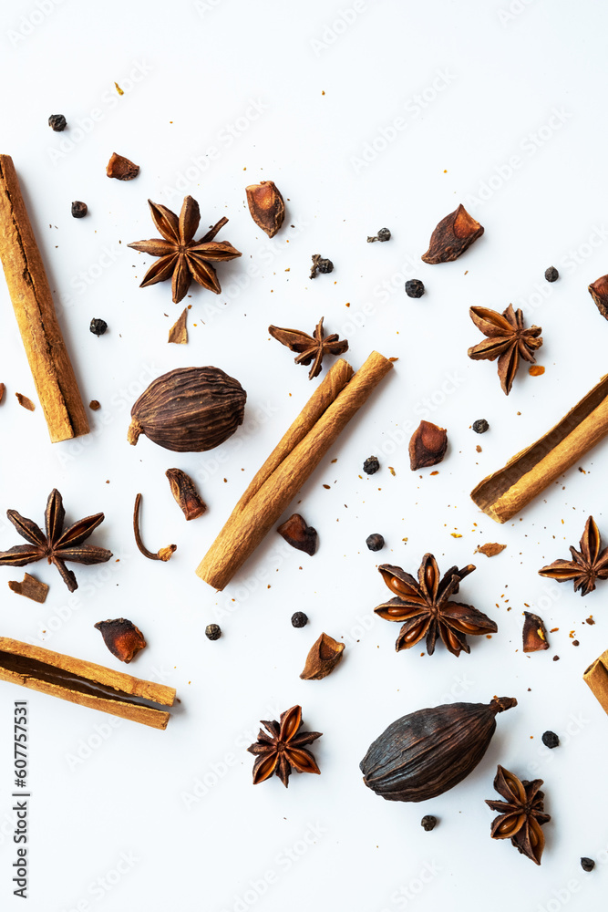 Dried star anise, cinnamon sticks and whole cardamon. Natural herbal spices seasoning collection.
