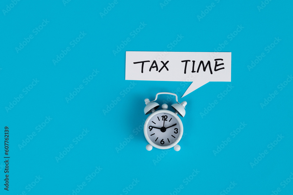 Alarm clock with tax time text Alarm clock with tax time text