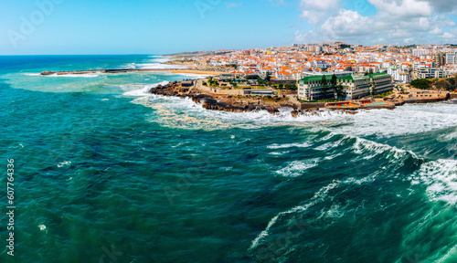 Beautiful oceanscape panorama with skyline, ocean rocky coastline. Drone view over beaches, coastlines in Ericeira, Portugal, on summer sunny day. Aerial view to the Beautiful European touristic town.