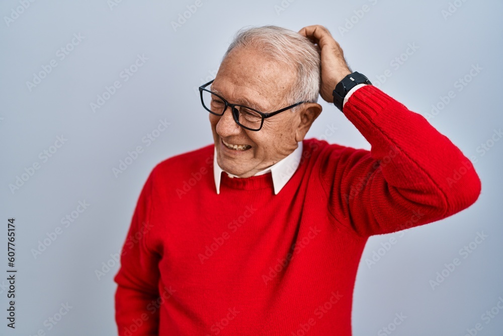 Senior man with grey hair standing over isolated background confuse and wondering about question. uncertain with doubt, thinking with hand on head. pensive concept. Senior man with grey hair standing over isolated background confuse and wondering about question. uncertain with doubt, thinking with hand on head. pensive concept.