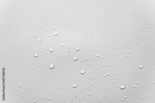 Water or rain drops on gray background 