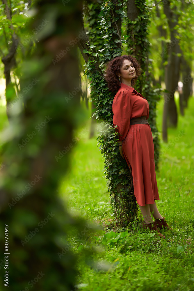 Candid of a mature curly hair redhead woman Candid of a mature curly hair redhead woman