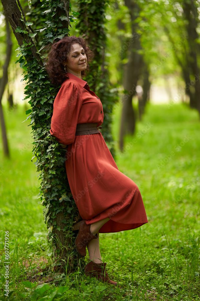 Candid of a mature curly hair redhead woman Candid of a mature curly hair redhead woman